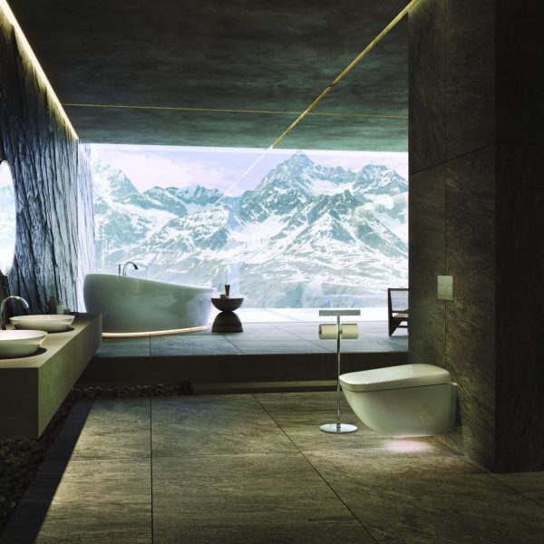 Ein Badezimmer mit Blick auf die Berge und modernen Sanitäranlagen. | casaceramica