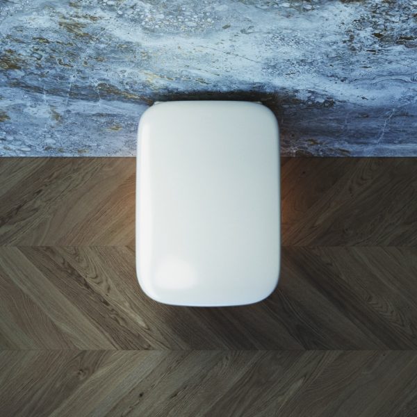 Eine weiße Lampe auf einem Holzboden in einer Badausstellung. | casaceramica
