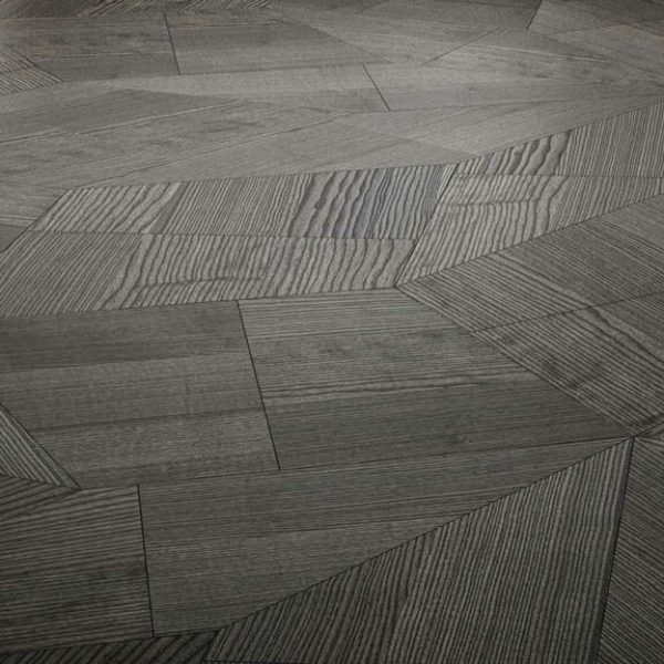 Ein Raum mit einem modernen schwarz-grauen Fliesenboden für eine elegante Badausstellung. | casaceramica